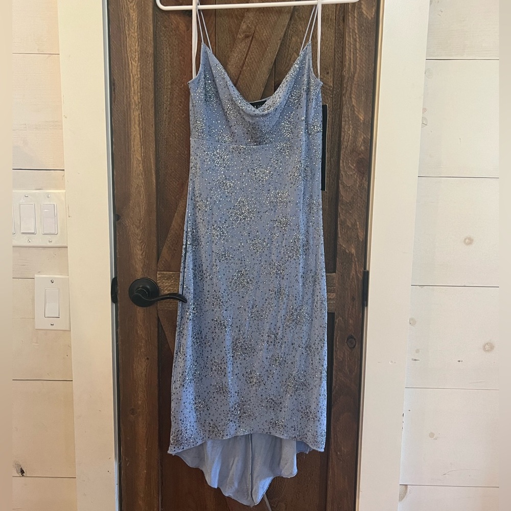 Women’s NWT periwinkle blue cocktail dress with silver and blue sparkly accent!